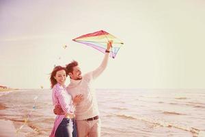 Couple enjoying time together at beach photo