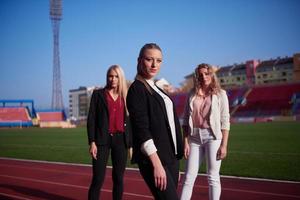 business people running on racing track photo