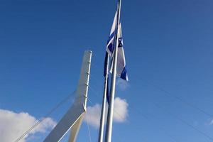 Flag in a city park on the Mediterranean coast in Israel. photo