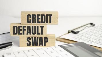 CDS Credit Default Swap - financial derivative that allows an investor to swap or his credit risk photo