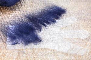 first layer of fibers on cutting pattern of glove photo