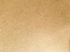 Old brown paper texture background or cardboard with copy space for design. photo