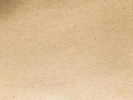 Old brown paper texture background or cardboard with copy space for design. photo