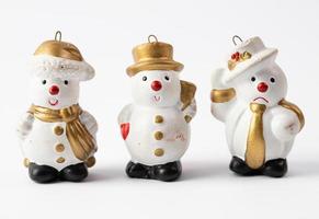 Snowmen on a white background photo