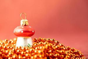 Christmas mushroom on a red background. Festive banner. photo