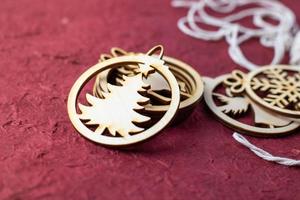 Handmade wooden decorations for the Christmas tree photo