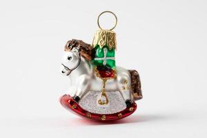 Christmas pony. Christmas ornament on a white background photo