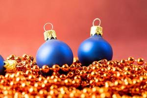 Christmas baubles on a red background. Christmas concept photo