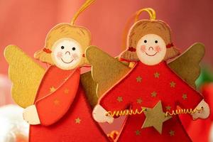 Christmas angels made of wood. Decoration for the Christmas tree. photo