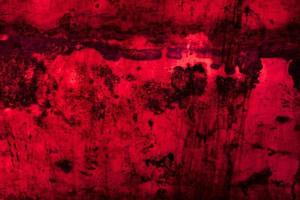 Scary dark red grunge wall concrete cement texture background photo