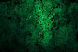 Scary dark green grunge wall concrete cement texture background photo