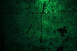Scary dark green grunge wall concrete cement texture background photo