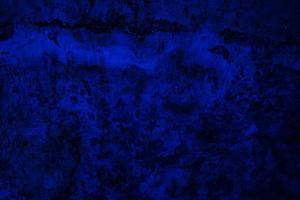 Scary dark blue grunge wall concrete cement texture background photo