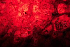 Scary dark red grunge wall concrete cement texture background photo