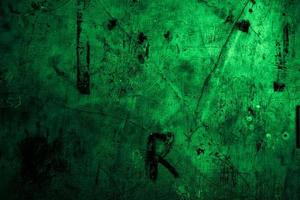 Scary dark green grunge wall concrete cement texture background photo