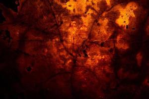 Scary dark red grunge wall concrete cement texture background photo