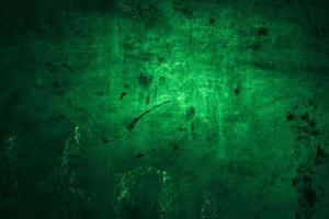 Scary dark green grunge wall concrete cement texture background photo