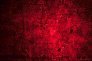 Scary dark red grunge wall concrete cement texture background photo