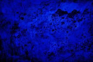 Scary dark blue grunge wall concrete cement texture background photo