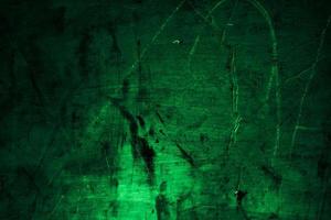 Scary dark green grunge wall concrete cement texture background photo