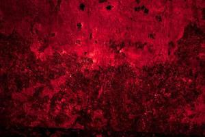 Scary dark red grunge wall concrete cement texture background photo