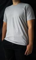 men wear plain T-shirts for mockups templates. blank t-shirt for front side design photo