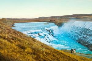 Gullfoss, or Golden Fall, a waterfall where is part of the Golden Circle located in the canyon of Olfusa river in southwest Iceland photo