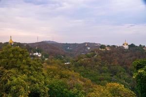 Sagaing hill with numerous pagodas and Buddhist monasteries on the Irrawaddy river, Sagaing, Myanmar photo