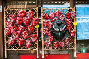 Kurama, Kyoto Prefecture, Kansai, Japan - November 21, 2019 - Tengu mask in a grocery near Kurama Station, local souvenir for tourist photo