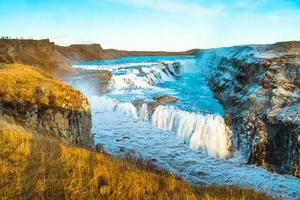 Gullfoss, or Golden Fall, a waterfall where is part of the Golden Circle located in the canyon of Olfusa river in southwest Iceland photo