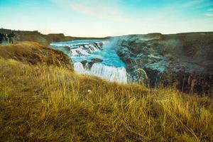 Gullfoss, or Golden Fall, a waterfall where is part of the Golden Circle located in the canyon of Olfusa river in southwest Iceland photo