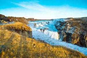 Gullfoss, or Golden Fall, a waterfall where is part of the Golden Circle located in the canyon of Olfusa river in southwest Iceland photo