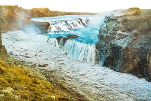 Gullfoss, or Golden Fall, a waterfall where is part of the Golden Circle located in the canyon of Olfusa river in southwest Iceland photo