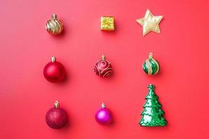 Christmas ball bauble pattern minimal flatlay on red background top view photo