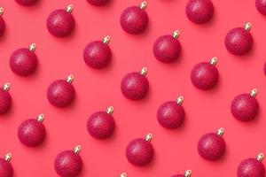 Christmas ball bauble pattern minimal flatlay on red background top view photo