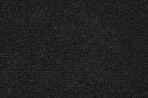texture and full-frame macro background of black synthetic car carpet photo