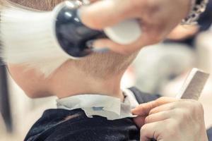 Cleaning after haircut. photo