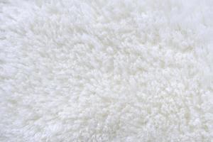 White fluffy fur fabric wool texture background photo