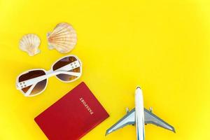 Concept of traveling on yellow background photo