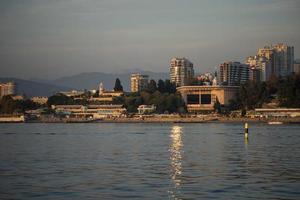 Sochi, Russia - October 8, 2010 Seascape with city view photo