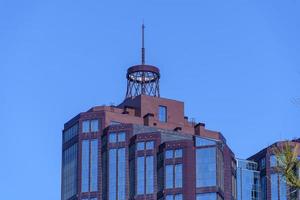 Vladivostok, Russia - May 9, 2022  Modern building on a blue sky background photo