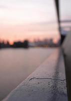 Selective focus on a balcony near the water in London, UK photo