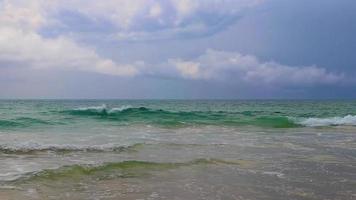 Naithon Beach bay turquoise clear water and waves Phuket Thailand. video