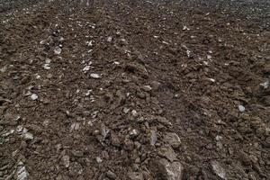freshly plowed soil - close full frame background with edge-to-edge sharpness photo