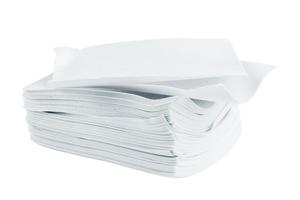 stack of white liquidless and powderless laundry detergent squares sheets isolated on white background photo