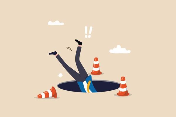 Failure or mistake causing catastrophe despair, problem or risk from crisis or recession, danger or business accident, trouble, loss or pitfall concept, terrified businessman fall down into the hole.