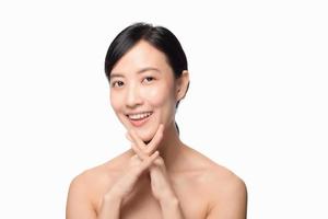 Portrait of beautiful young asian woman clean fresh bare skin concept. Asian girl beauty face skincare and health wellness, Facial treatment, Perfect skin, Natural make up on white background photo