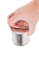 bare caucasian hand opens a tin can with a pull ring on a white background photo