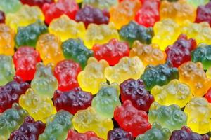 closeup full-frame background of colorful jelly bears laid closely photo