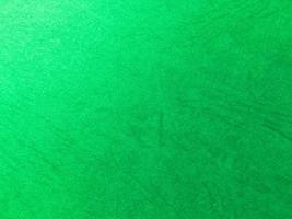 Green paper texture background with pattern for design. Copy space for text and work photo